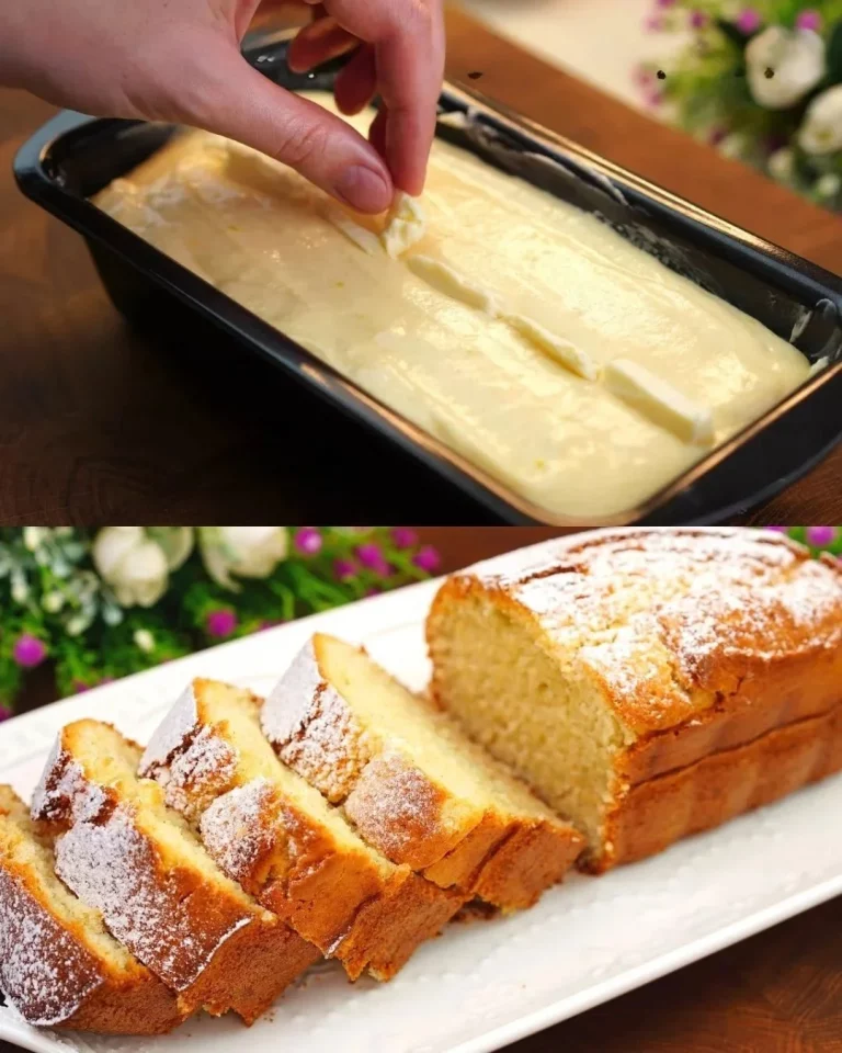 Pastel de limón decorado con rodajas de limón y crema