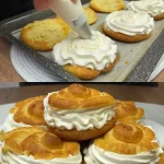 Profiteroles de crema de limón con adornos de azúcar y limón fresco.