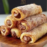 Rollo de Pan Perdido recién horneado con ingredientes frescos y deliciosos