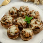 Plato de champiñones rellenos con carne