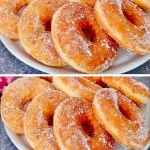 Variedad de donas frescas y esponjosas decoradas con glaseado colorido.