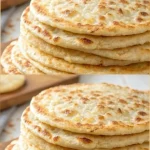 Pan de requesón hecho con solo 2 ingredientes sobre una mesa de cocina.