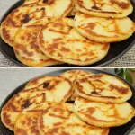 Plato de arepas de queso recién hechas, doradas y rellenas de queso derretido