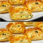 Rollitos de masa de hojaldre rellenos de queso crema dorados y apetitosos.