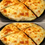 Tortilla rellena con ingredientes frescos y coloridos sobre un plato.